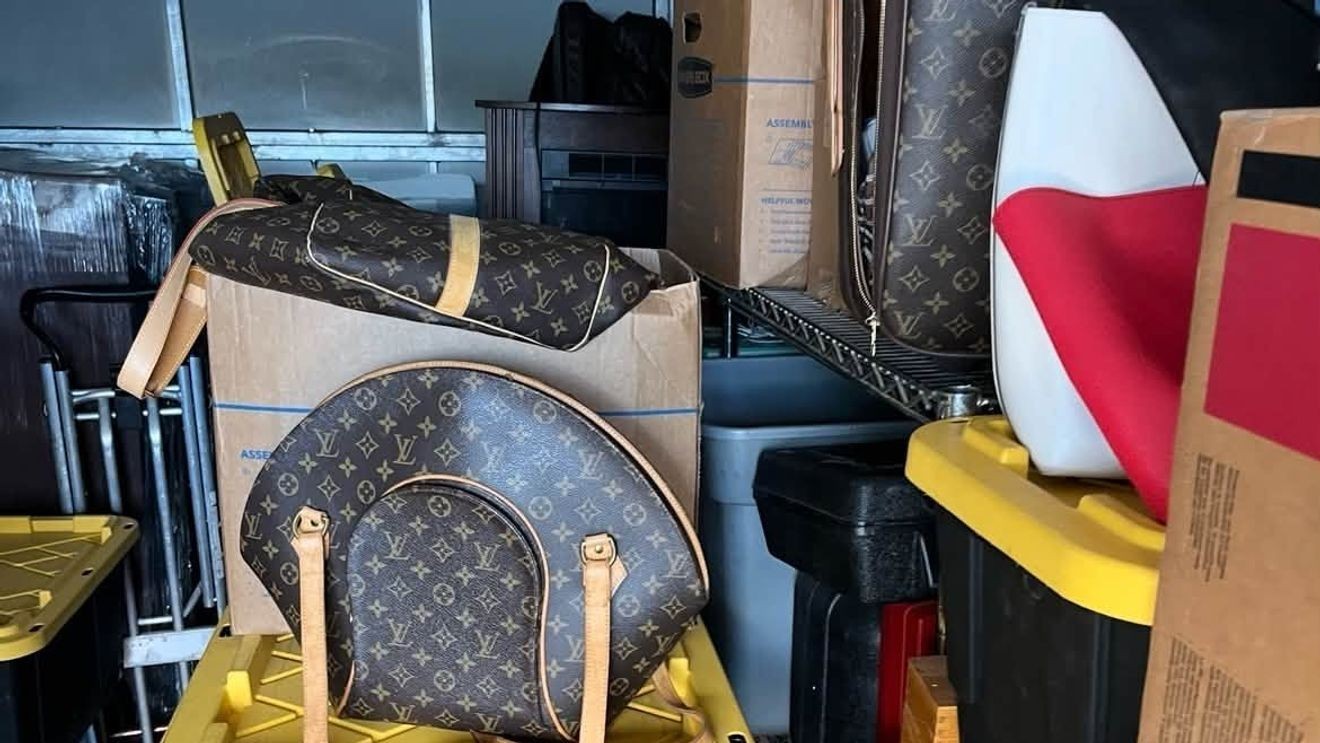 Stolen property recovered by deputies, including jewelry and designer bags